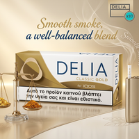 Delia Classic Gold packaging for IQOS with a balanced scale and gold accents on a beige background.