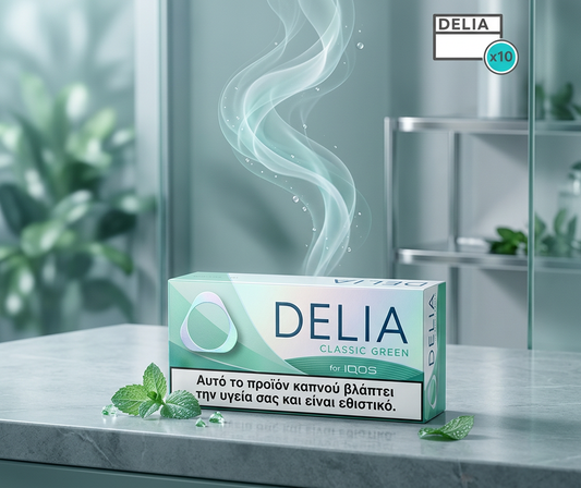 Box of Delia Classic Green dental floss on a marble surface with a blurred background