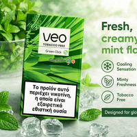 Veo Tobacco Free Green Click menthol pouch packaging standing on a light stone surface with mint leaves, ice cubes, and a glass bowl of mint in the background. Text on the right describes the flavor as fresh, creamy mint, with cooling sensation, minty freshness, and tobacco free.