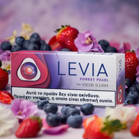 Levia Forest Pearl vape device packaging surrounded by strawberries, blueberries, and flowers on a blurred background